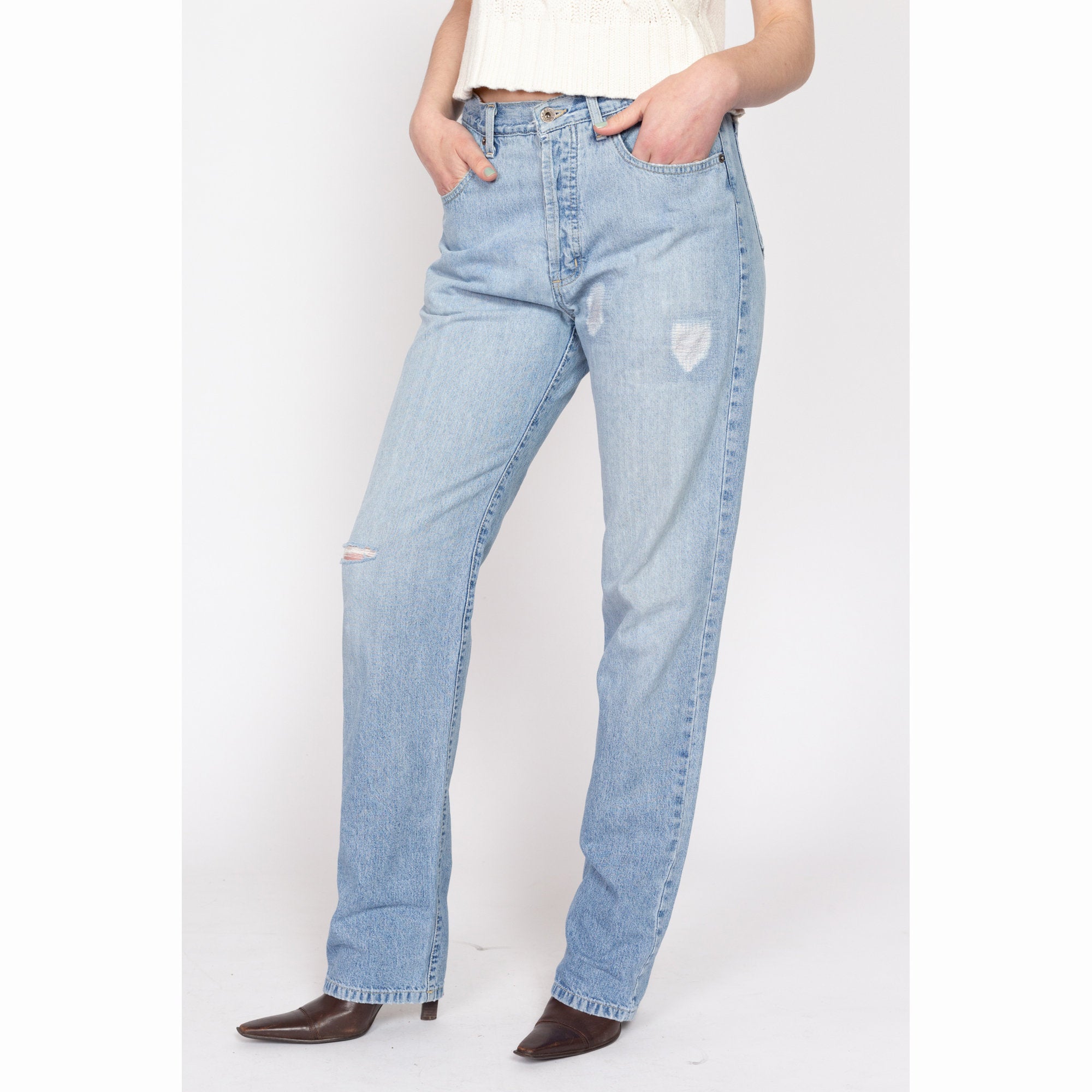 Vintage High-waisted Guess Jeans in Ultra bleached light outlet wash.