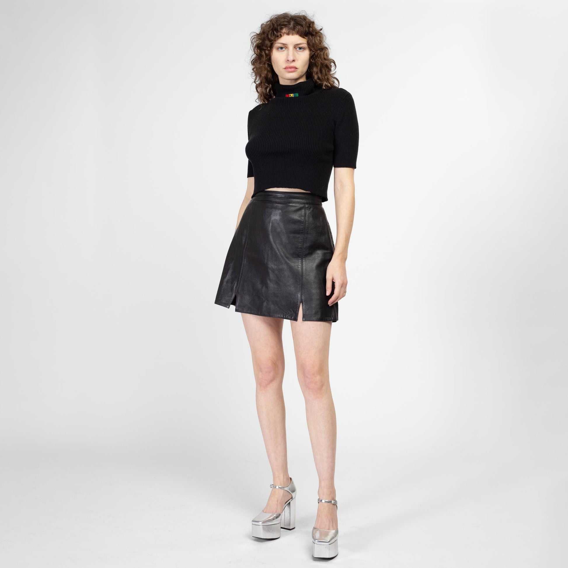 Medium 90s Black Leather A Line Mini Skirt 28.5" | Vintage Minimalist High Waisted Front Slit Miniskirt