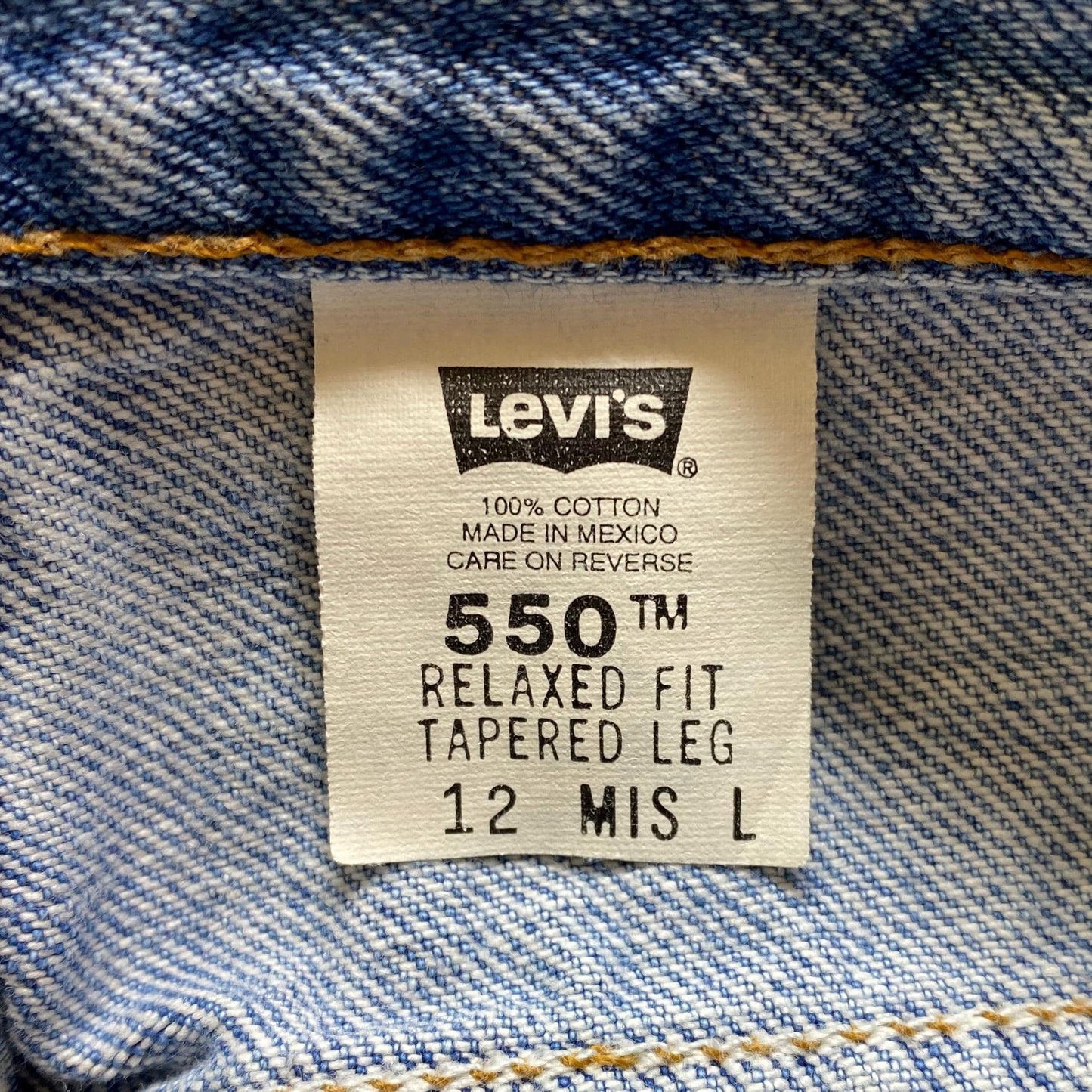 Medium 90s Levis 550 Mom Jeans 30" | Vintage Levi's Light Wash Denim High Waisted Tapered Leg Jeans