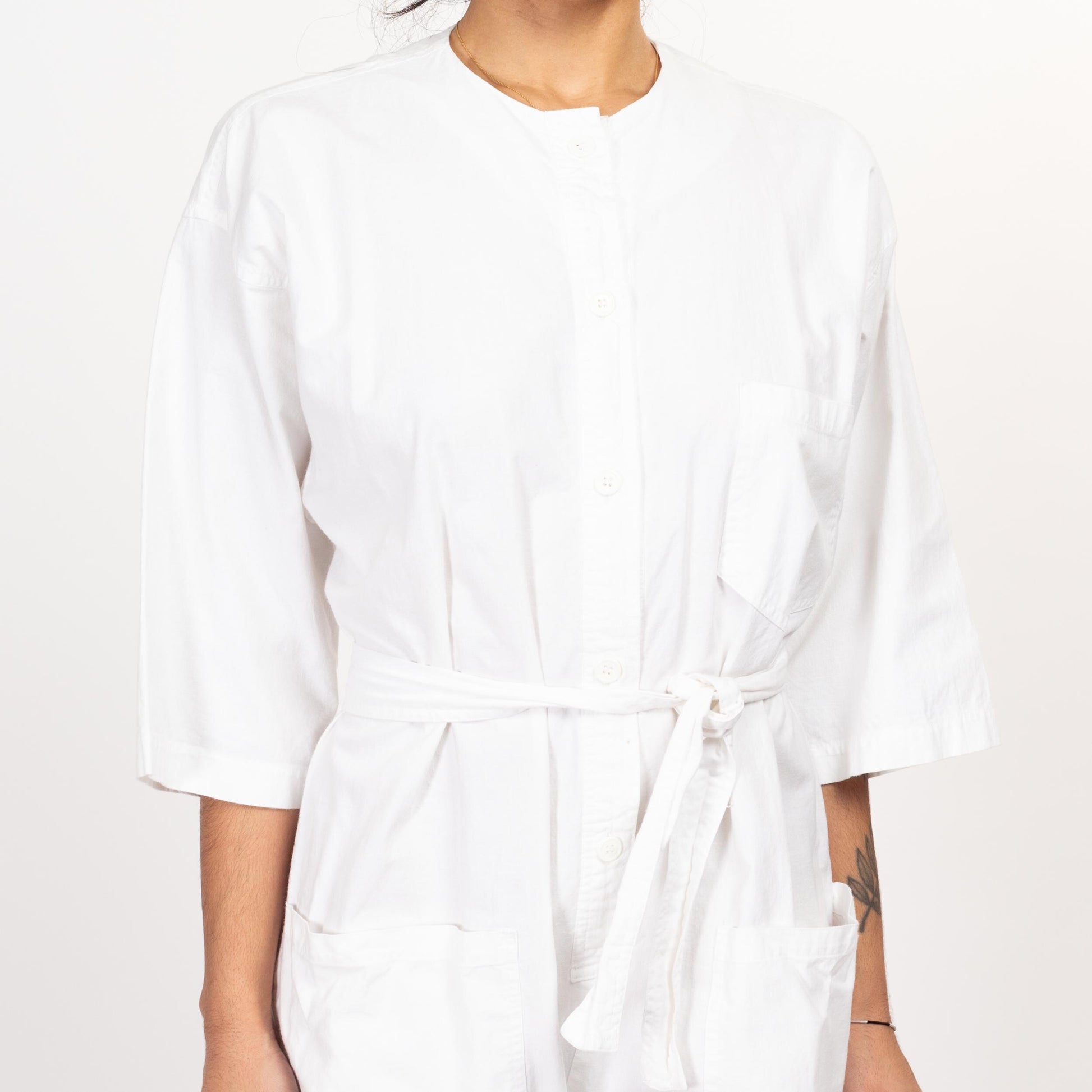 Small 90s Diane Von Furstenberg White Cotton Jumpsuit | Vintage Minimalist Fitted Waist Long Sleeve Button Up Coveralls