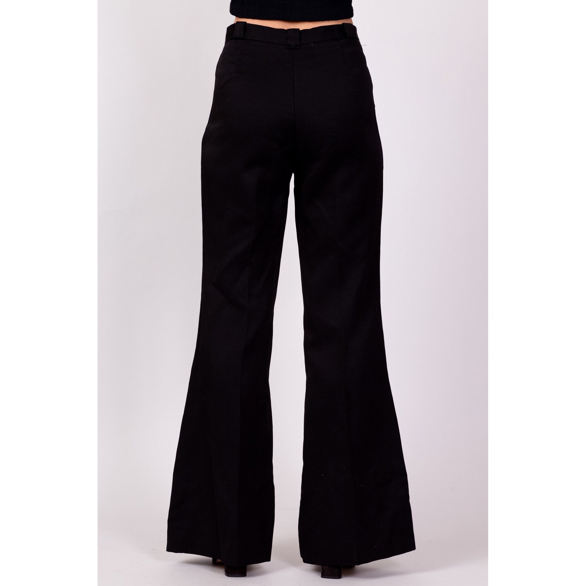 The High Waist Flare Pant is our latest style addition to our stretch dress  pant collection. For added style this tall pant features a wide flare leg  and a subtle full front