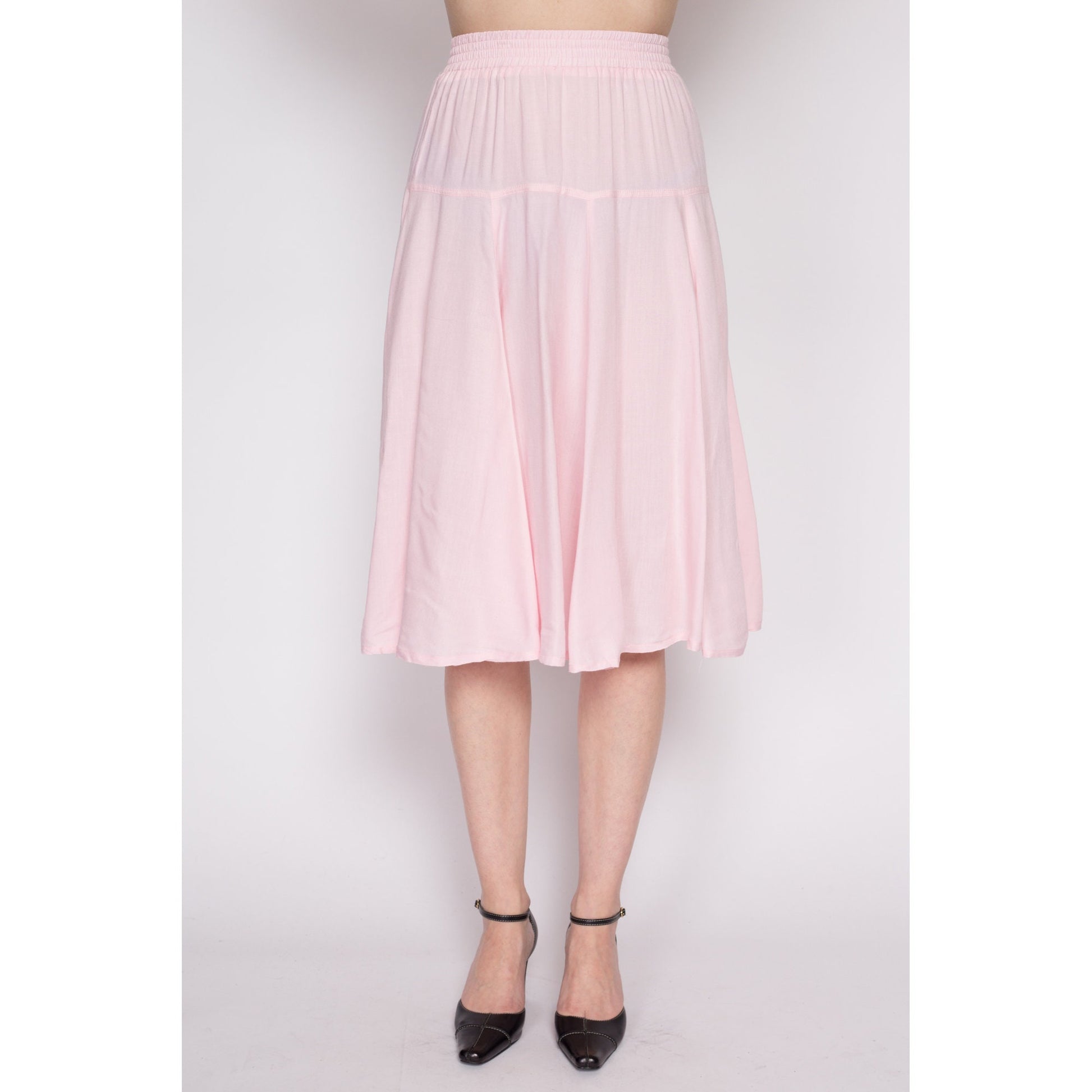 Pastel pink midi skirts